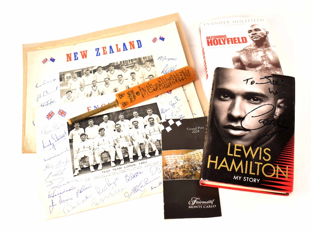 A quantity of signed and facsimile signed memorabilia to include a Lewis Hamilton book and a