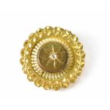 A 19th century yellow metal and diamond bull's-eye brooch,