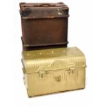 An early 20th century wood and canvas brass-bound travel trunk,