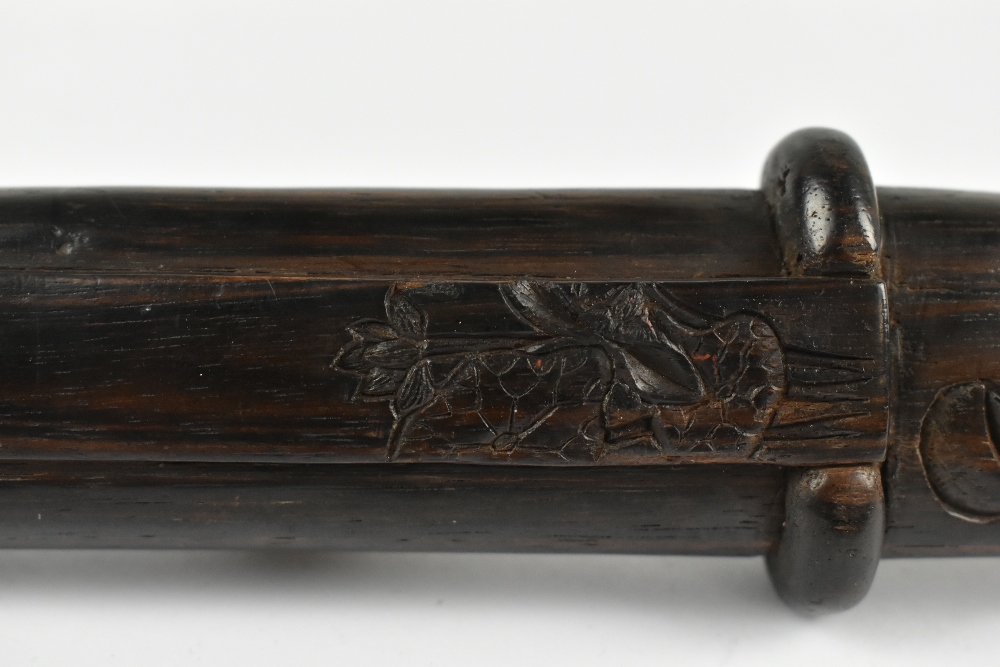 A good Japanese Meiji period hardwood doctor's accutchi with carved detail featuring ascetic monk, - Image 5 of 6