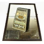 A.WIDD OF BRADFORD; an original advertising pictorial wall mirror, 'Ogden's Guinea Gold Cigarettes',