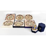 ROYAL CROWN DERBY; six limited edition Christmas series plates with certificates of authenticity,