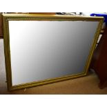 A modern gilt framed bevelled wall mirror, 99 x 130.5cm.