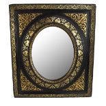 A late 19th/early 20th century ebonised rectangular wall mirror with gilt highlights surrounding