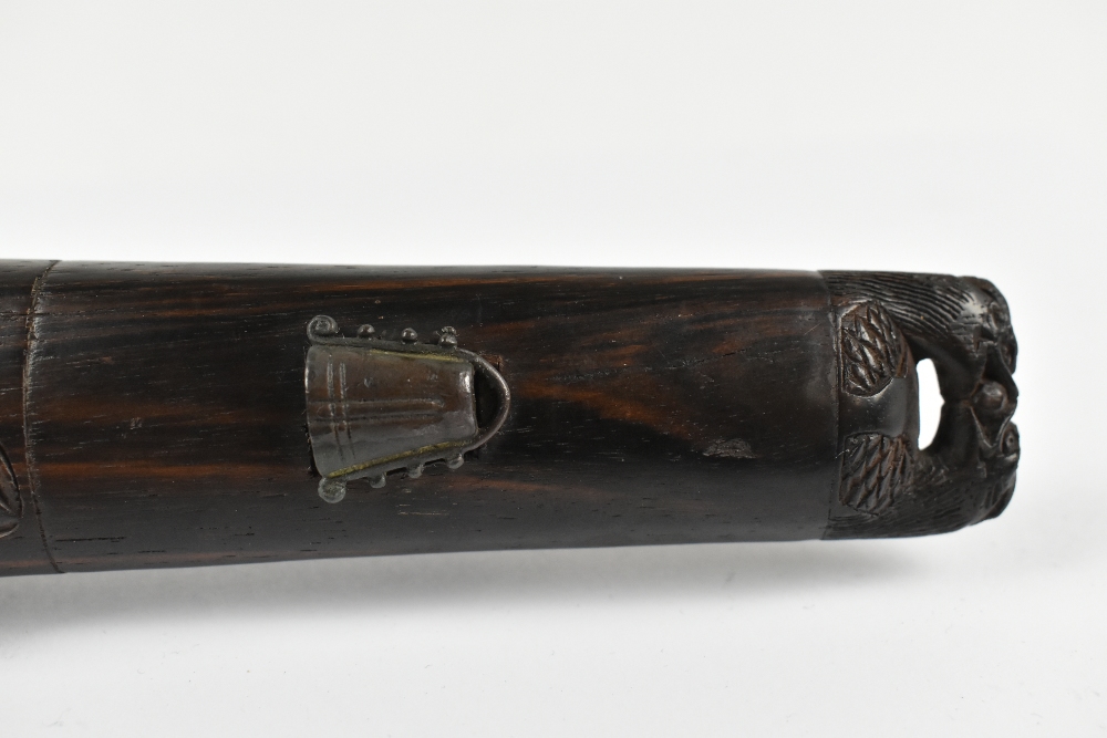 A good Japanese Meiji period hardwood doctor's accutchi with carved detail featuring ascetic monk, - Image 6 of 6