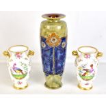 SPODE COPELANDS CHINA; a pair of gilt heightened twin handled vases decorated with floral sprays and