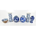 A pair of early 20th century Chinese blue and white porcelain sleeve vases painted with four claw
