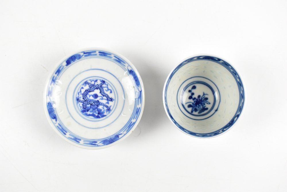 A Chinese 'rice inset' tea bowl painted with a floral spray to the centre and a shallow dish - Image 2 of 3