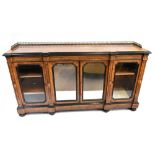A Victorian figured walnut inlaid and ebonised credenza in the manner of Lamb of Manchester with