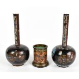 A pair of early 20th century Japanese cloisonné enamel onion vases with elongated necks, decorated
