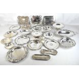 A group of silver plated items to include a repoussé and pierced decorated rectangular basket, a