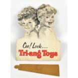 TRI-ANG; a card advertising sign, 'Coo! Look... Tri-ang Toys', featuring boy and girl, with easel