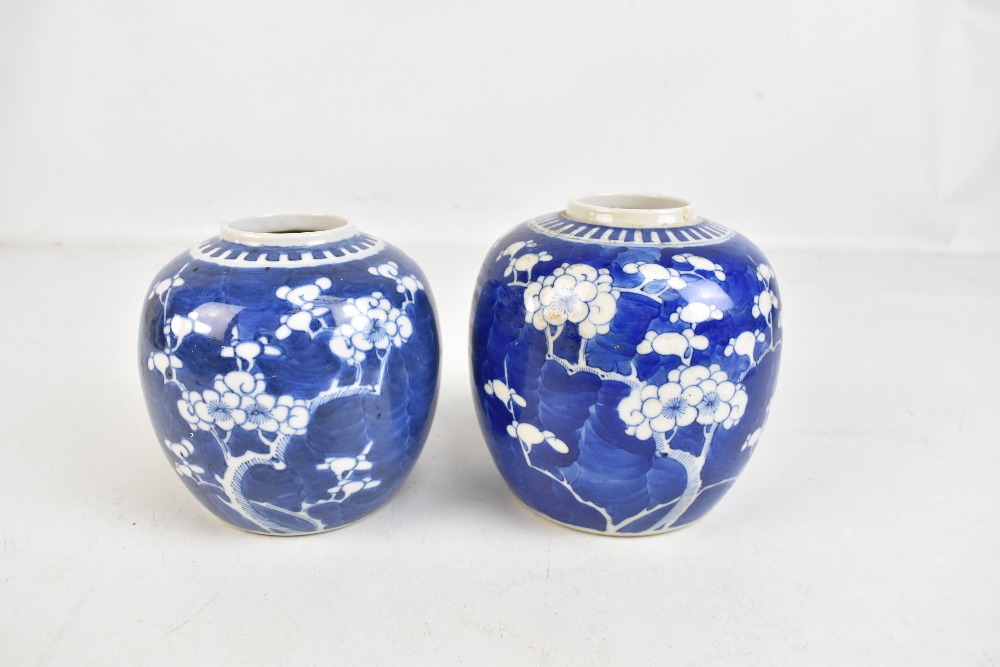 Two similar early 20th century Chinese blue and white prunus decorated jars, height 14cm and 13cm, - Image 3 of 6