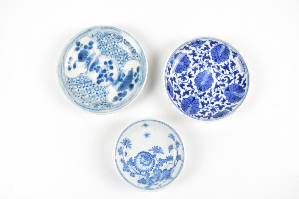 Three Chinese blue and white floral decorated saucer dishes, the larger two unmarked, the smallest - Image 2 of 3
