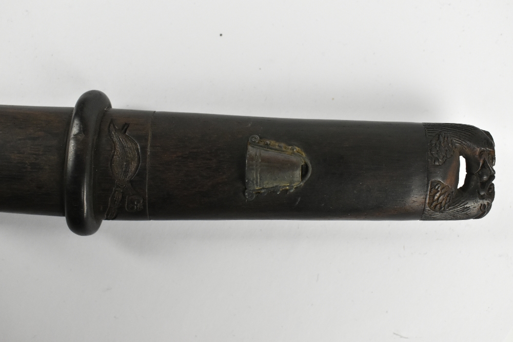 A good Japanese Meiji period hardwood doctor's accutchi with carved detail featuring ascetic monk, - Image 3 of 6