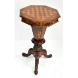 A Victorian walnut, satinwood inlaid and chevron banded chess top sewing table with octagonal hinged