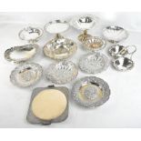 A group of silver plated items to include pedestal bowls, repoussé decorated bowl, cake stand, etc.