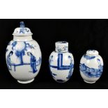 Three 18th century Chinese blue and white porcelain lidded jars, each painted with figures in