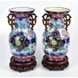 A pair of late 19th century Staffordshire earthenware vases in the Chinese manner with pierced
