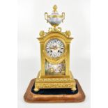 HENRY MARC OF PARIS; a 19th century gilt metal mantel clock with urn finial with painted porcelain