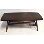 ERCOL; a dark elm coffee table with slatted undertier, length 105cm, width 45cm. Additional