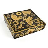 A good Japanese Meiji period rectangular lacquered box with gilt floral and scroll decoration,