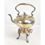 An early 20th century silver plated spirit kettle on stand, with cast floral decoration and acorn