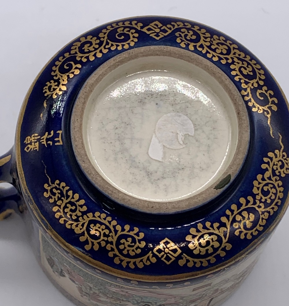 KINKOZAN; a Japanese Meiji period Satsuma cup and saucer decorated with panels of seated figures - Image 8 of 8
