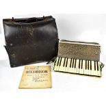 HOHNER; a 'Verdi I' accordian and a booklet on learning to play the accordian by T.W. Thurvan.