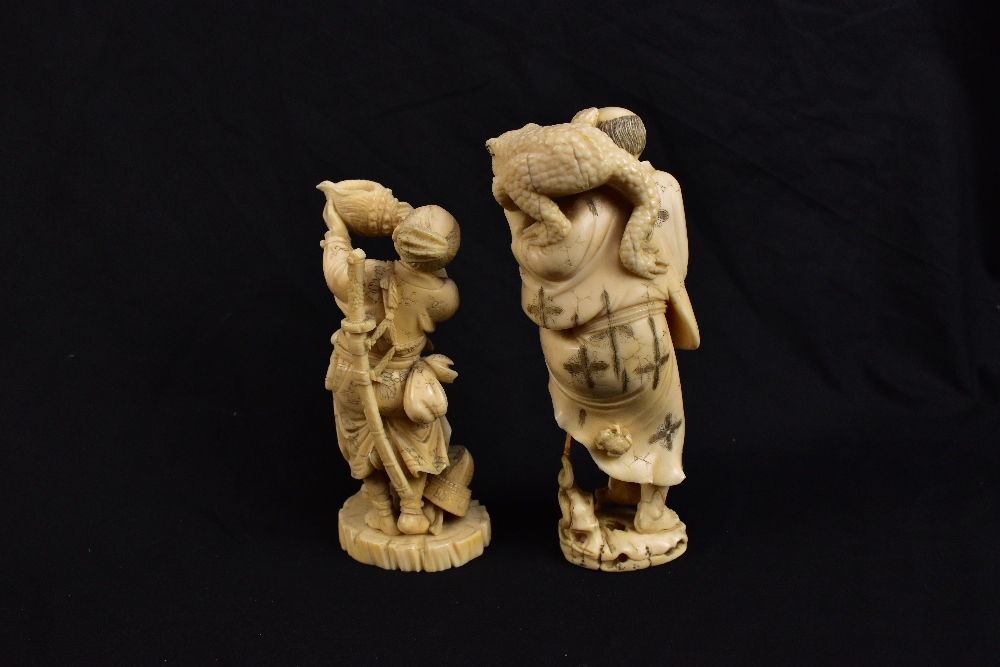 A Japanese Meiji period carved ivory okimono modelled as a warrior blowing into a conch shell with a - Image 3 of 5