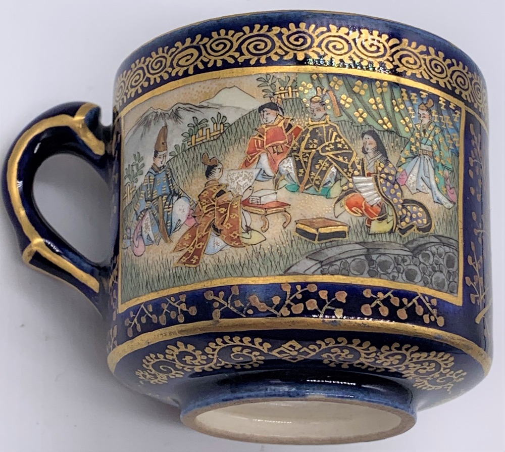 KINKOZAN; a Japanese Meiji period Satsuma cup and saucer decorated with panels of seated figures - Image 7 of 8