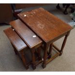 An oak nest of three tables, the largest 51 x 34cm, a modern gilt oval overmantel mirror with