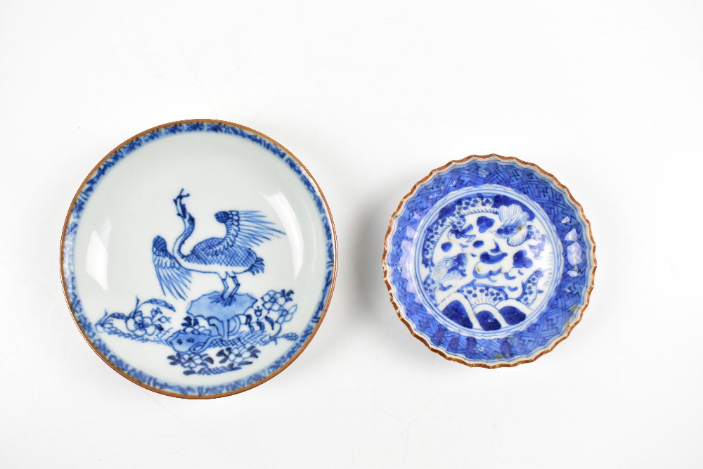 A Chinese blue and white porcelain saucer decorated with a crane swallowing a fish, diameter 11. - Image 2 of 3