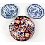 Two 18th century Chinese porcelain octagonal plates, one example painted with a variant of the