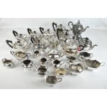 A group of various silver plated tea ware to include H & S three piece tea set, part gadrooned and