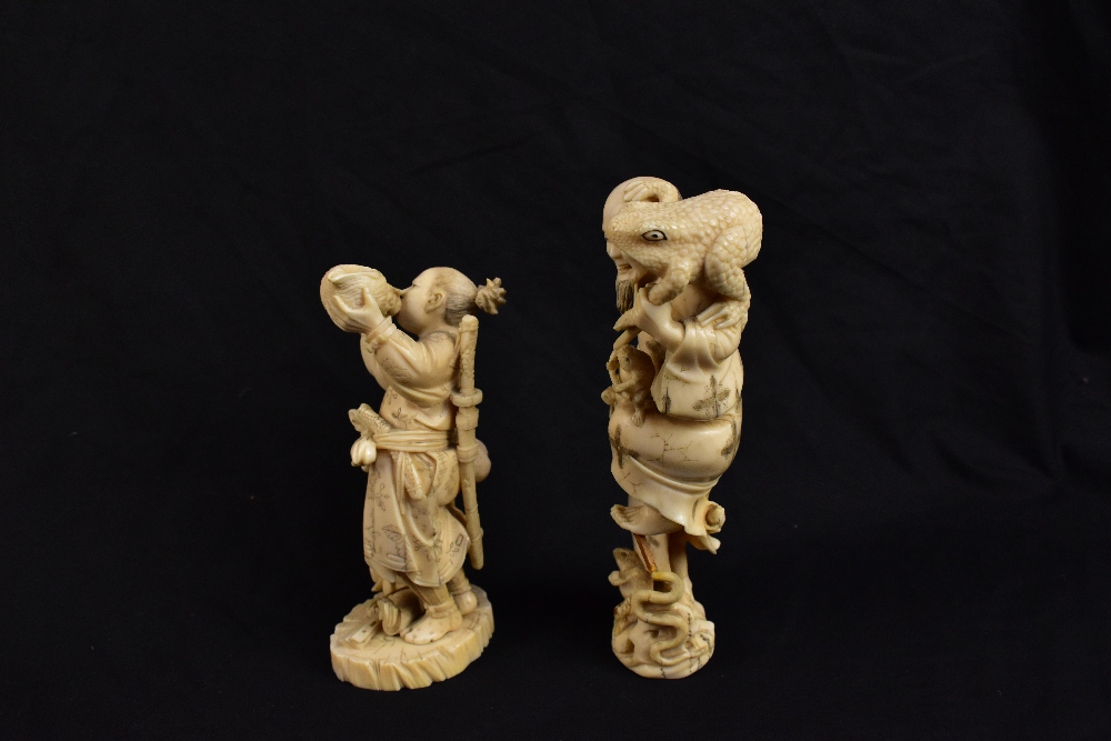 A Japanese Meiji period carved ivory okimono modelled as a warrior blowing into a conch shell with a - Image 2 of 5