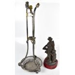 CHRISTOFLE; a 19th century electroplated three branch table lamp with cast detail on three scroll