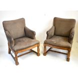 A set of four open framed armchairs in grey suede upholstery on stretchered turned and block