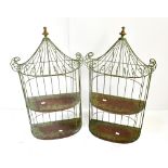 A pair of contemporary wirework two tiered hanging wall shelves of bow front form, width 44cm,