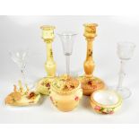 ROYAL WORCESTER; a five piece blush ivory dressing table set with floral decoration, puce factory