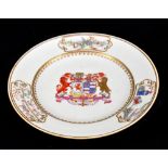 An 18th century Chinese export porcelain armorial plate with central crest inscribed 'Essayez Quid