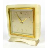 ELLIOTT; a 1950s onyx mantel clock retailed by Ollivant & Botsford, height 15cm.Additional