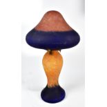 A contemporary glass table lamp and shade, with internal mottled decoration, height 53cm.