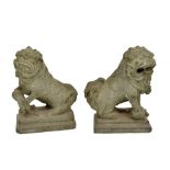 An unusual pair of 18th century or earlier Chinese carved stone temple lions, height 17.5cm.