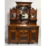 A Victorian mahogany mirror back sideboard with dentil cornice and carved detail, the base with