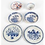 A small group of 18th century porcelain comprising two transfer decorated quail pattern saucers, two