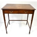 An Edwardian inlaid mahogany writing table with leather inset top, raised on tapering block