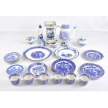 A quantity of blue and white ceramics predominantly in the Willow pattern including Booths Real