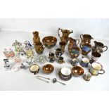 A collection of 19th century and later ceramics including Staffordshire money boxes, assorted lustre