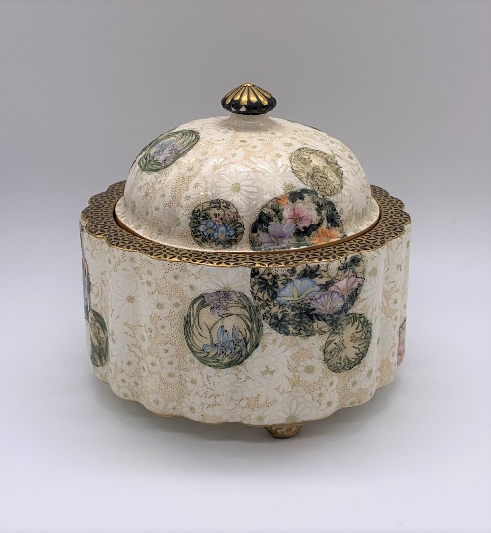 KINKOZAN; a Japanese Meiji period Satsuma kogo with moulded domed cover above floral decorated